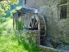 La ruota a cassetti veniva posta in rotazione tanto dall'impeto dell'acqua che la colpiva quanto dal peso esercitato dalla stessa riempiendo i cassetti.