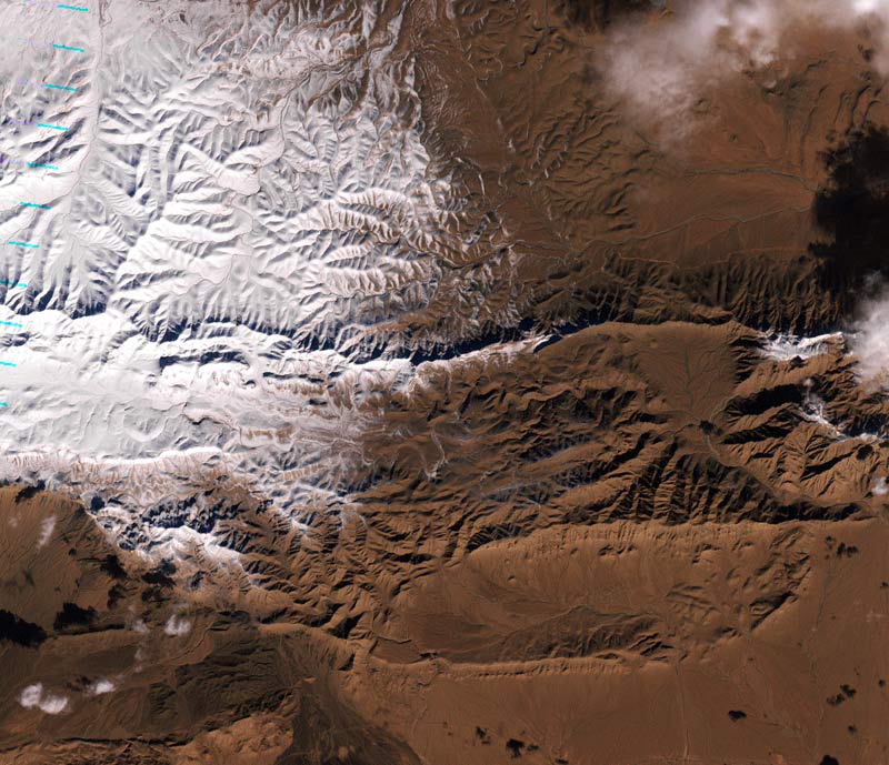  This scene is south of the city of Bouarfa and southwest of Ain Sefra, which saw its first snowfall in 37 years. (Earth Observatory)